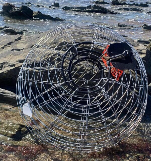 Cray-Zee Beehive Craypot on the shore by the sea